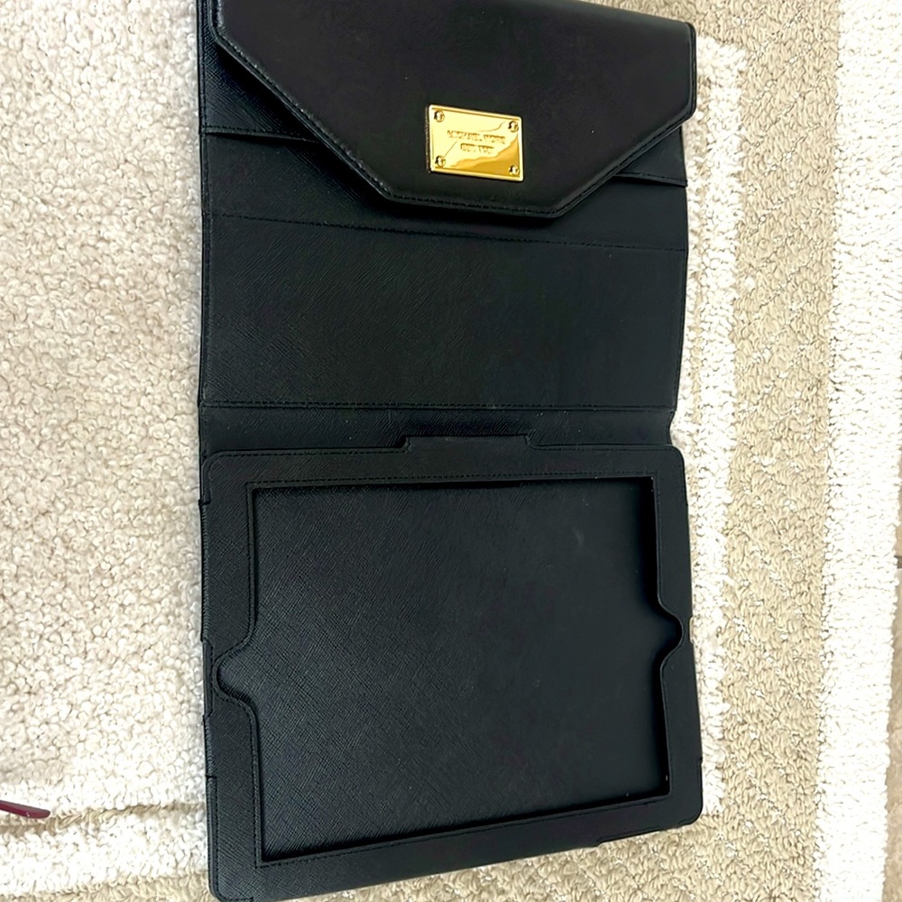 Michael Kors Tablet Case Black with card slots and pen holder.